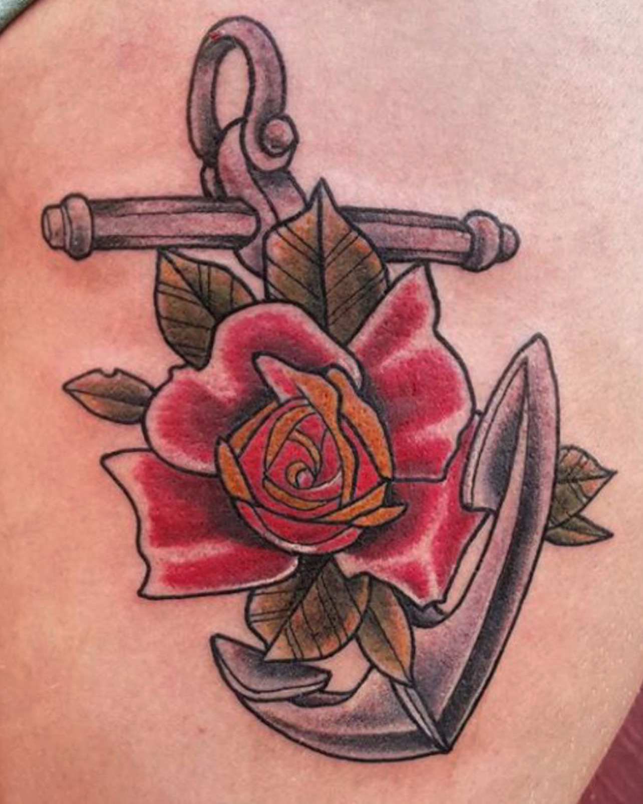 Knitted tattoo of a rose with music elements and the name ashley on Craiyon